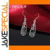 Vintage Silver Drop Earrings with Filigree Design