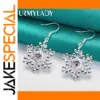 Elegant Sterling Silver Snowflake Earrings with Purple Zircon