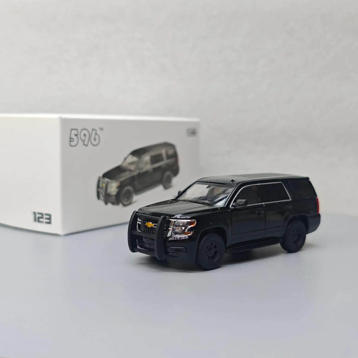 Black Police SUV Diecast Model 1:64 Scale 1 Black Police SUV Diecast Model 1:64 Scale