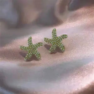 Vintage White Pearl Flower Earrings 13 S1c4e04a788ed4d2fb74ffad213b011160