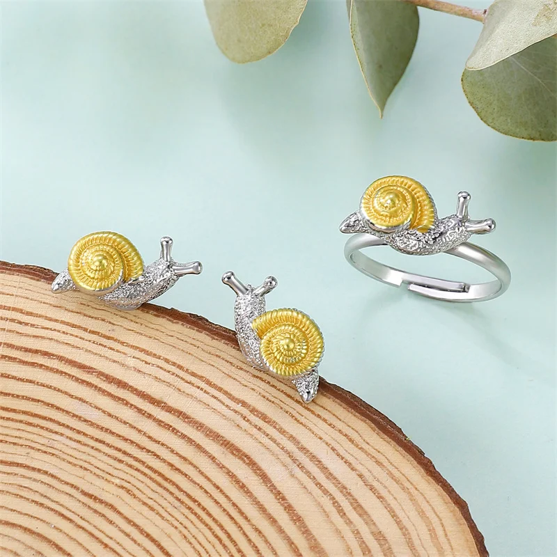 Stylish Snail-Shaped Gold and Silver Earrings 3 Stylish Snail-Shaped Gold and Silver Earrings - Image 3