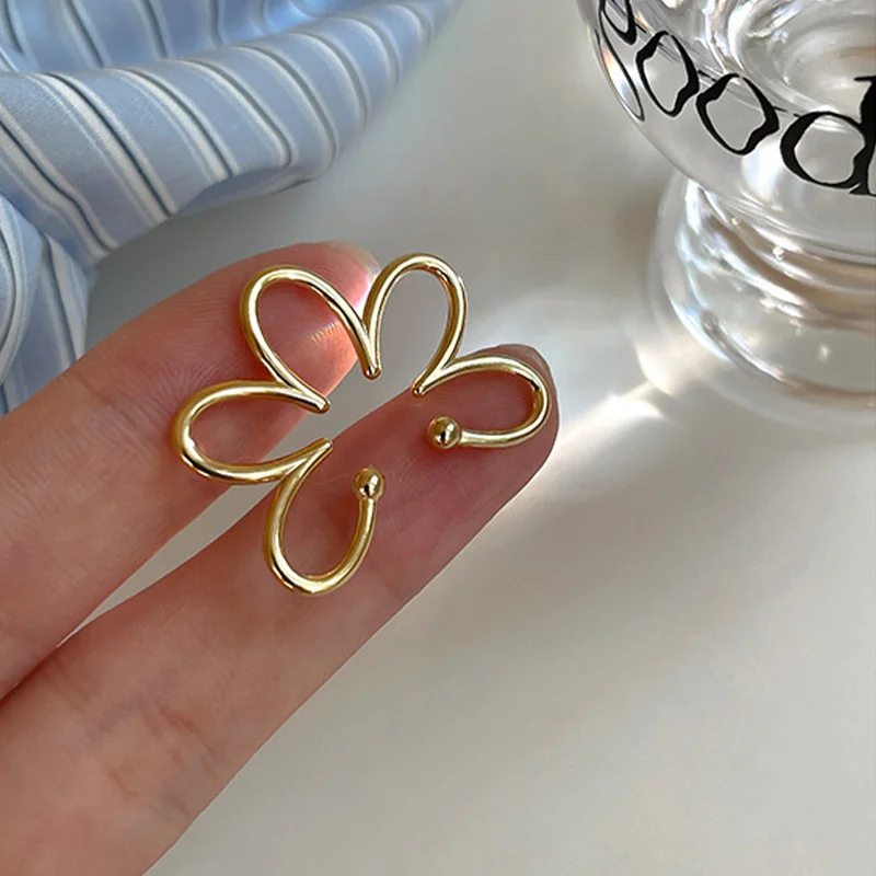 Stylish Silver Flower Clip Earrings 2 Stylish Silver Flower Clip Earrings - Image 2