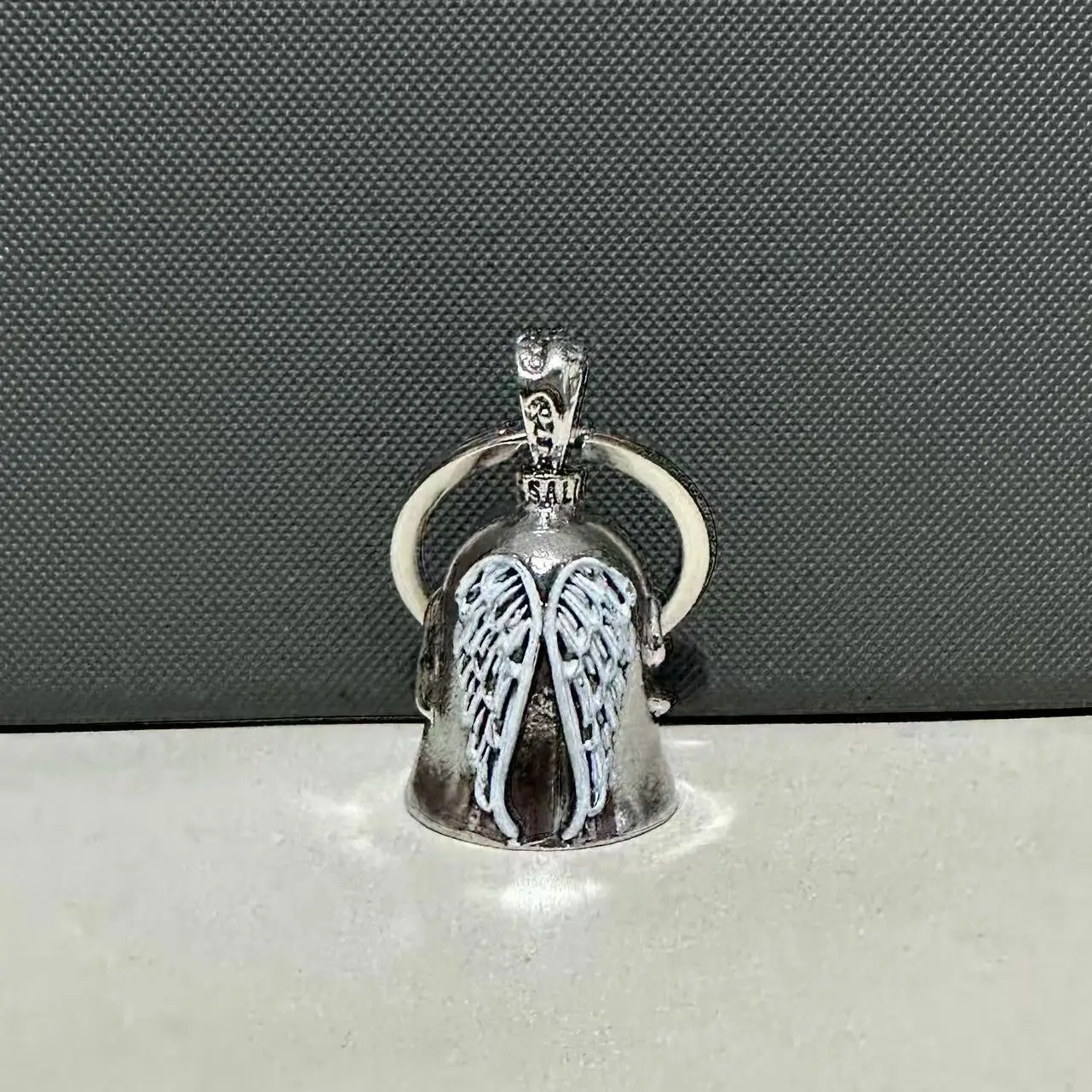 Titanium Motorcycle Bell Keychain with Embossed Wings 7 Titanium Motorcycle Bell Keychain with Embossed Wings - Image 7