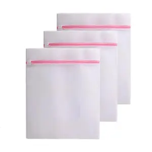 Set of Four Polyester Laundry Bags with Pink Zippers 15 S9e5427ee3e054663b7c7f68a693cb4e10